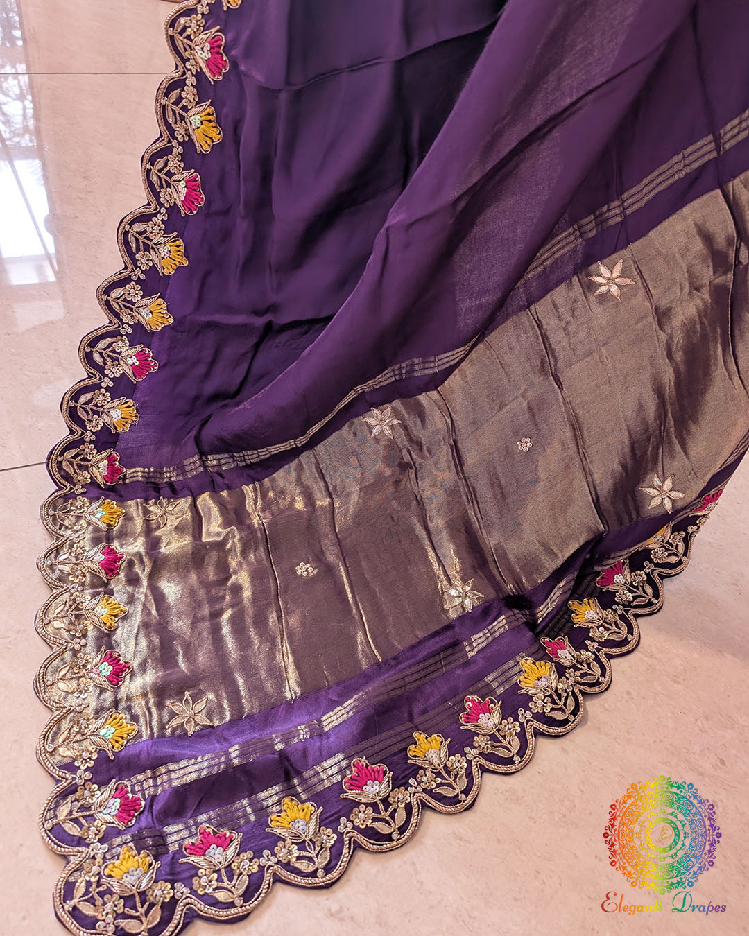 Close up of brinjal gaji silk saree highlighting gota patti and resham handwork