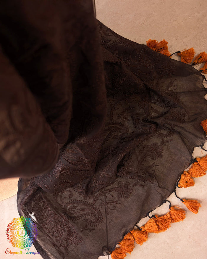 Close-up of Chikankari threadwork on the pallu of Coffee Brown Mul Cotton Saree