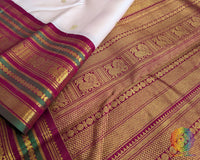 Off white handwoven Kanjivaram silk saree green red pallu alternate view