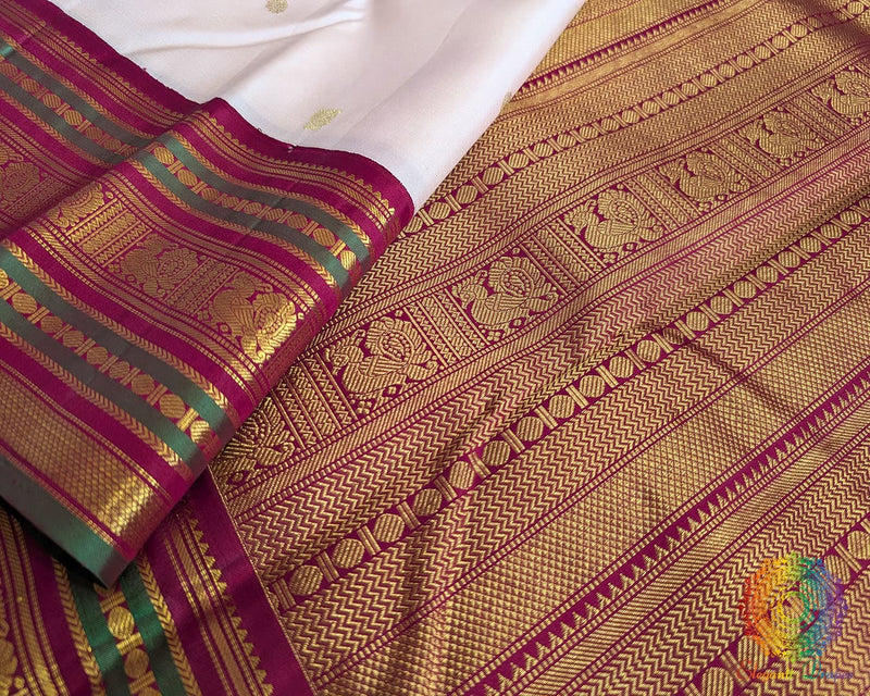 Off white handwoven Kanjivaram silk saree green red pallu alternate view