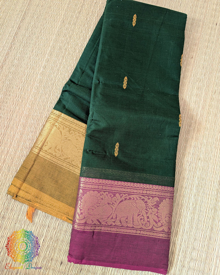Deep green Kanchi cotton saree folded view with traditional Ganga Jamuna border