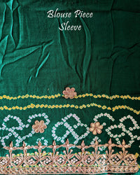 Close-up of the matching blouse sleeve with coordinated Gota Patti detailing