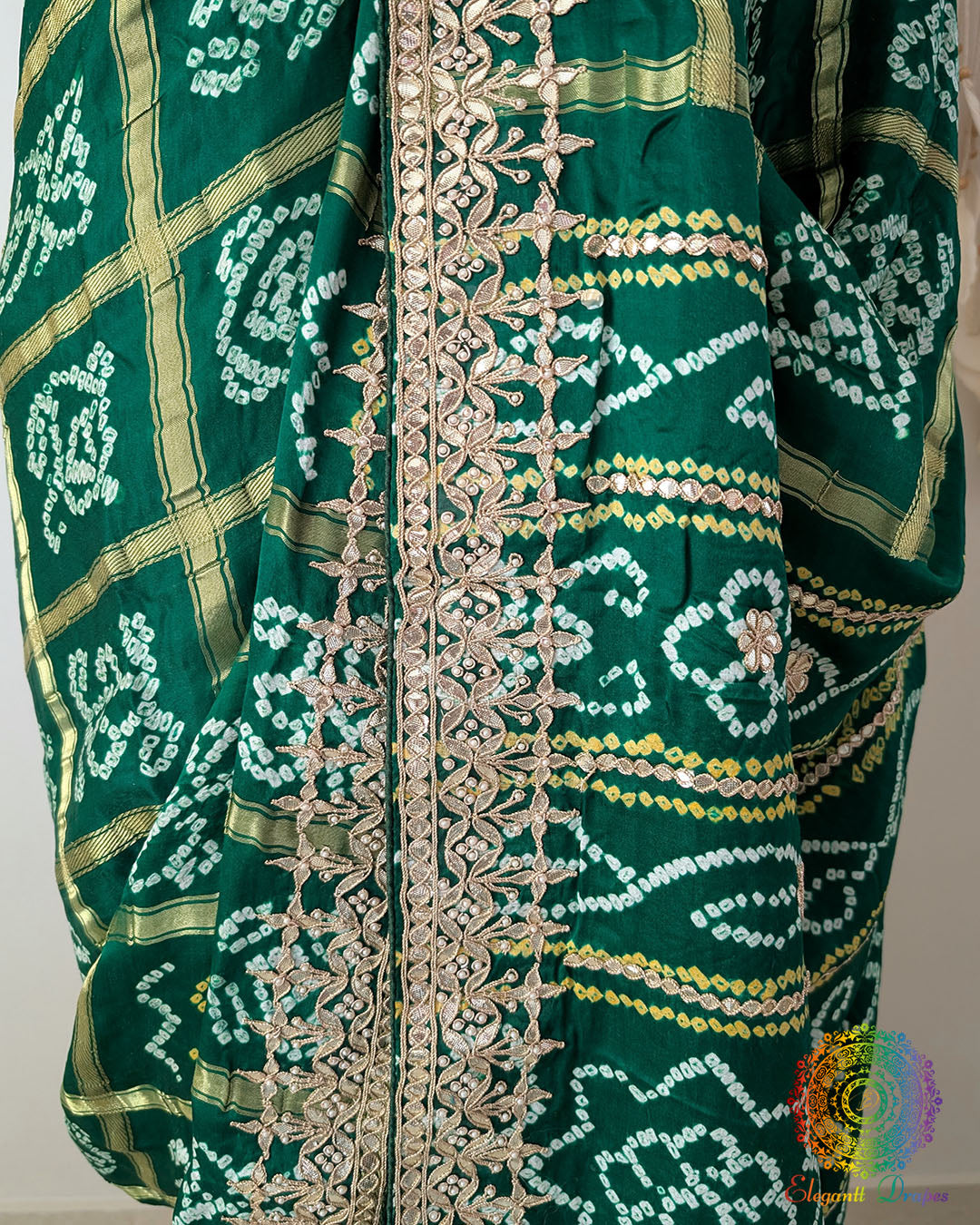 Detailed border featuring Gota Patti handwork on the Deep Green Gaji Silk Gharchola Saree