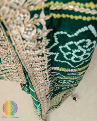 Full pallu view of the Deep Green Gharchola Saree with traditional Bandhani check pattern