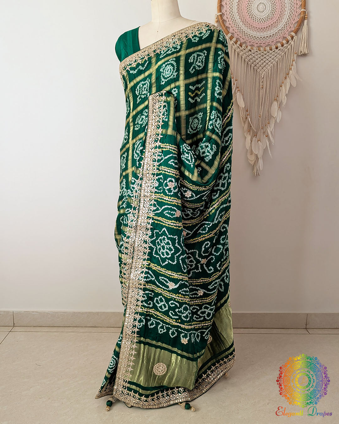 Side view of the Deep Green Gaji Silk Gharchola Saree showcasing its elegant drape