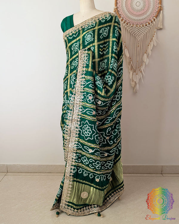 Side view of the Deep Green Gaji Silk Gharchola Saree showcasing its elegant drape