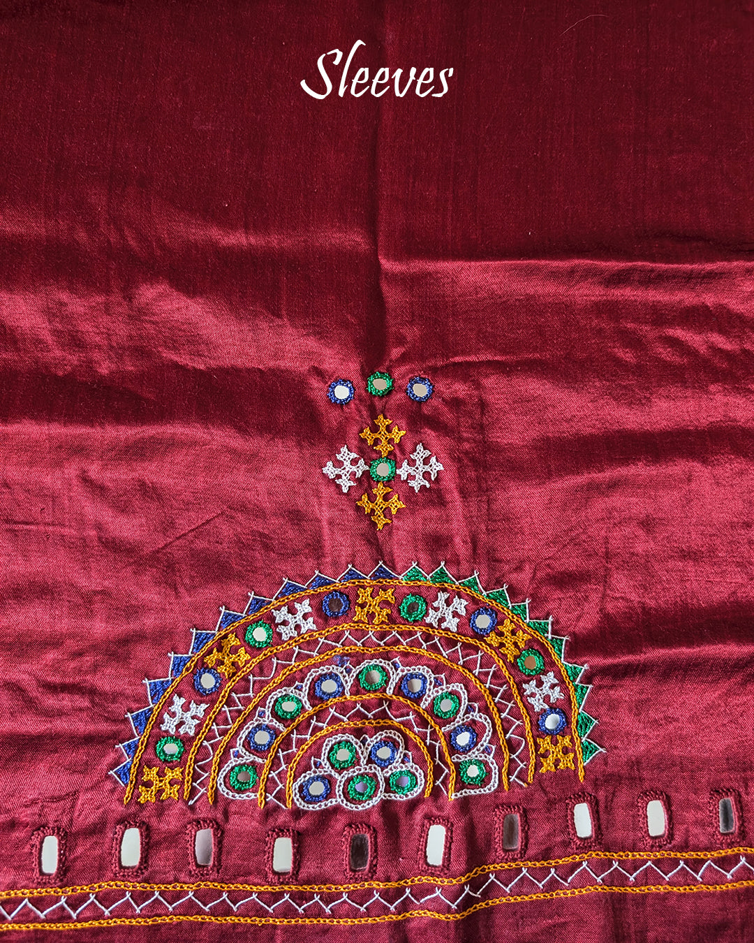Sleeve embroidery detail on deep red Bavadiya handwork blouse fabric