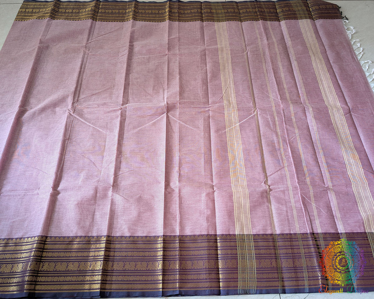 Full dusty pink Kanchi cotton saree laid open showcasing overall design and drape