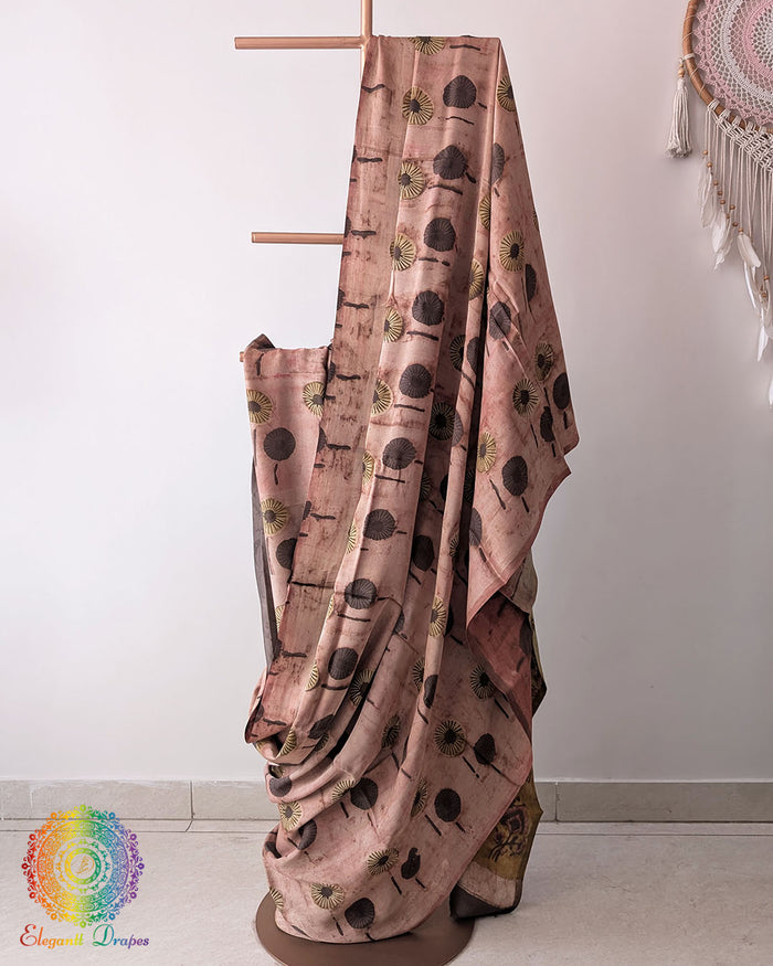 Blush Pink Modal Tussar Saree draped with Pomegranate Nashpal dye