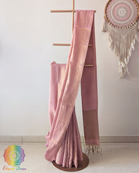 Blush pink Bengal linen tissue saree showing elegant drape and luminous texture