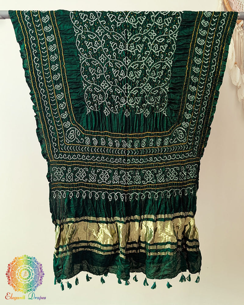 Close up of emerald green bandhani gaji silk dupatta showing tie dye detail