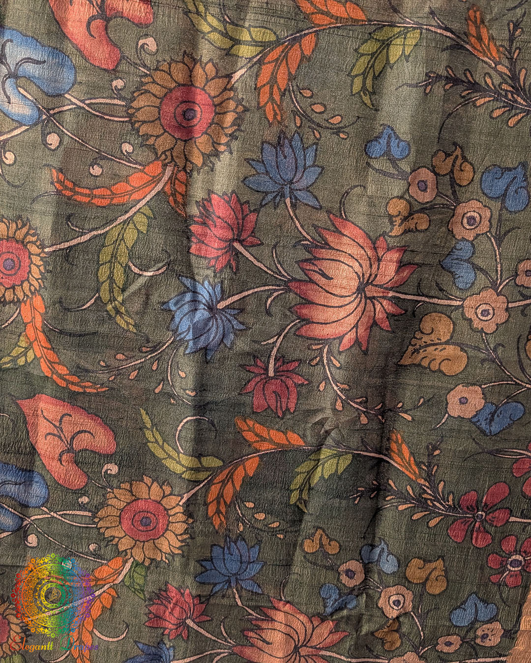 Close-up of intricate hand-painted Kalamkari motifs on Forest Green Pure Tussar Silk dupatta