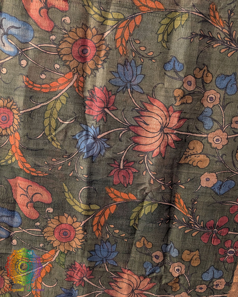 Close-up of intricate hand-painted Kalamkari motifs on Forest Green Pure Tussar Silk dupatta