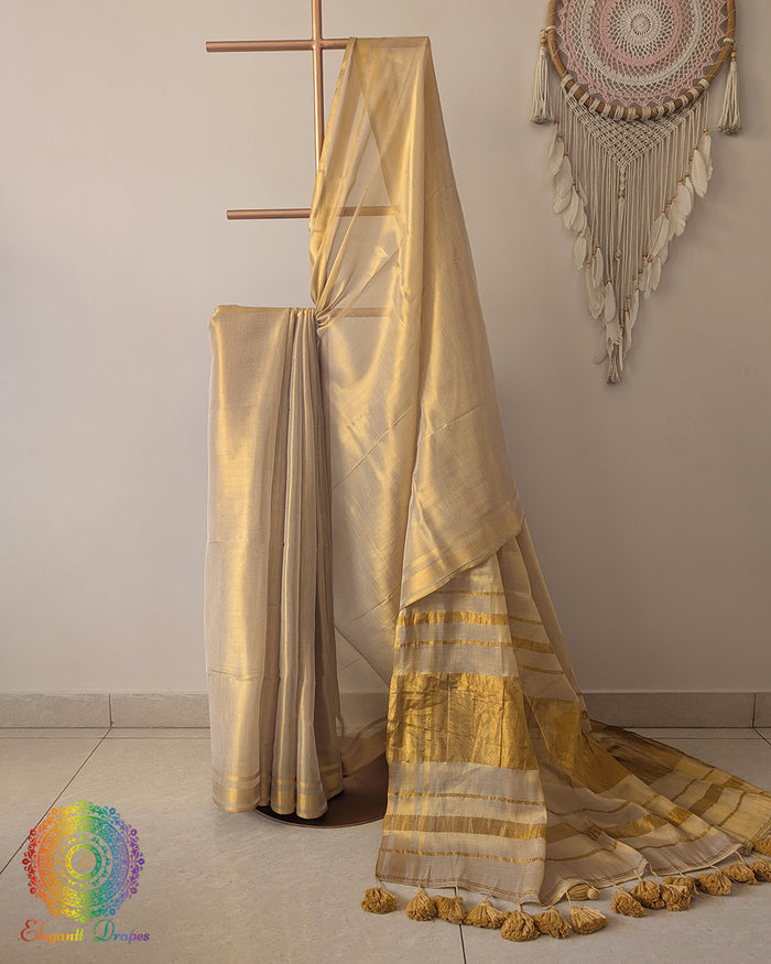 Golden bengal tissue linen saree with heavy pom poms Elegantt Drapes
