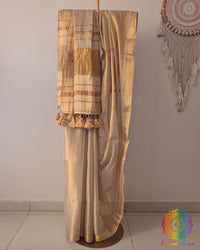 Golden bengal tissue linen saree showing full drape and pom pom detailing