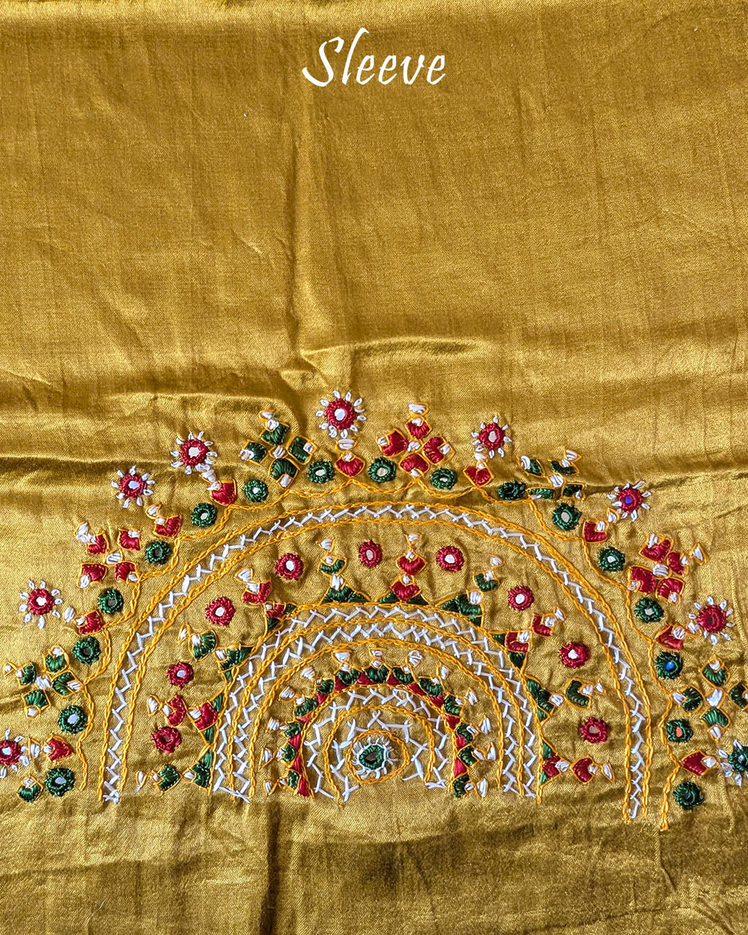 Close-up of semi-circular Bavadiya handwork on Golden Mustard Mashru Silk Blouse Piece sleeve