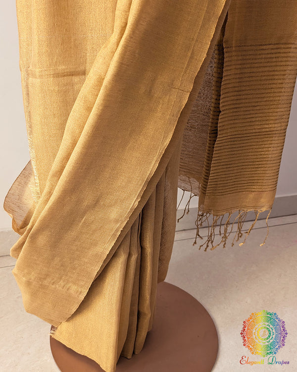 Golden Bengal linen tissue saree fabric close up showing tissue sheen