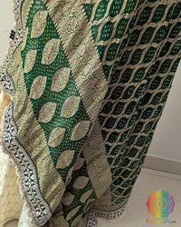 Festive green dupatta with scalloped border detailing