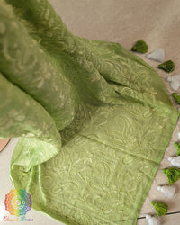 Close-up of heavy Chikankari machine embroidery on Green Mul Cotton Saree