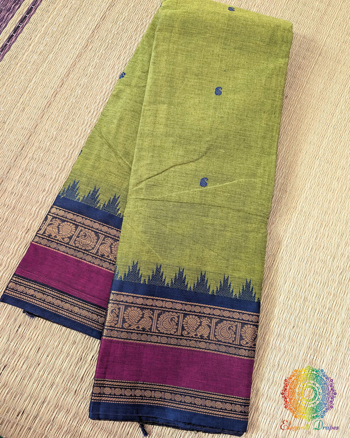 Green Kanchi cotton saree folded view showing contrast blue and pink border
