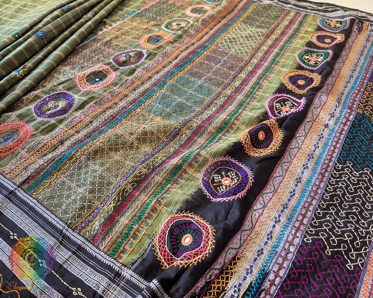 Green checks Ilkal cotton saree showcasing approximately half-meter heavily embroidered Lambani palla
