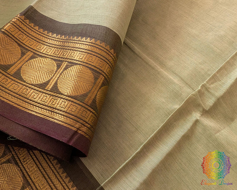 Close up of border on pale green Kanchi cotton saree highlighting weave detail