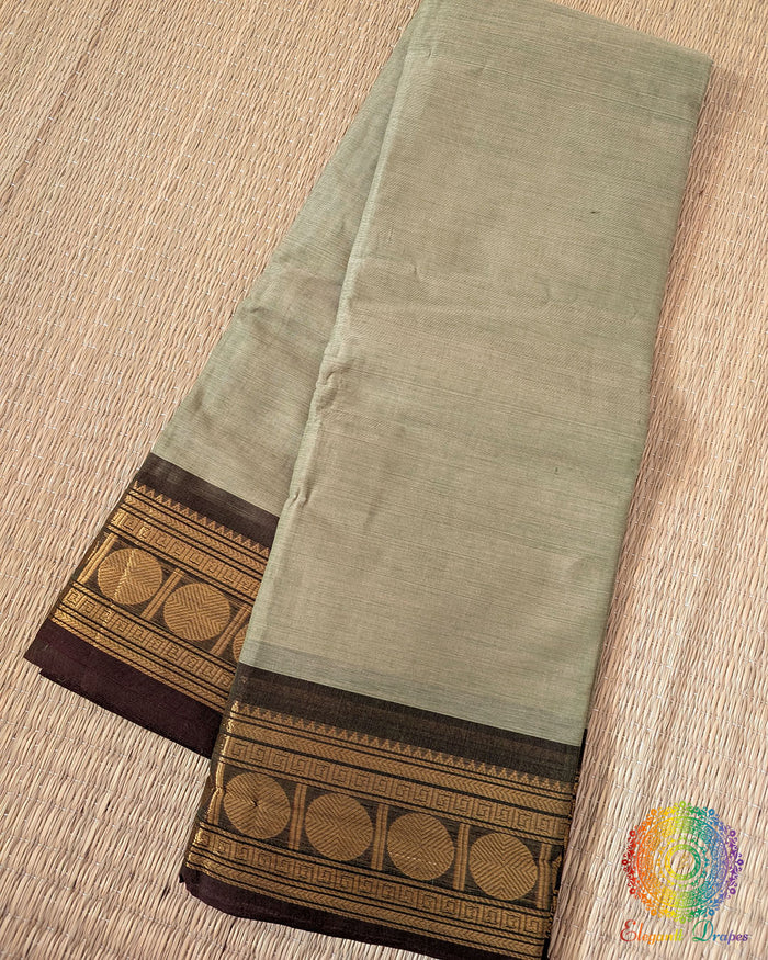 Pale green Kanchi cotton saree folded view showing soft tone and texture
