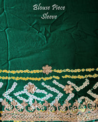 Close-up of the matching blouse sleeve with coordinated Gota Patti detailing