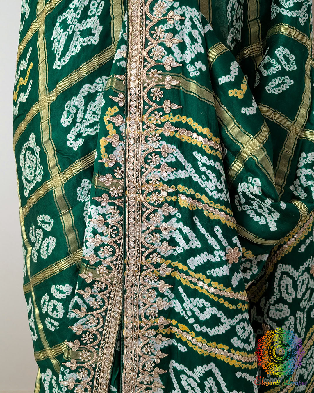 Detailed border featuring Gota Patti handwork on the Emerald Green Gaji Silk Gharchola Saree