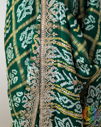 Detailed border featuring Gota Patti handwork on the Emerald Green Gaji Silk Gharchola Saree