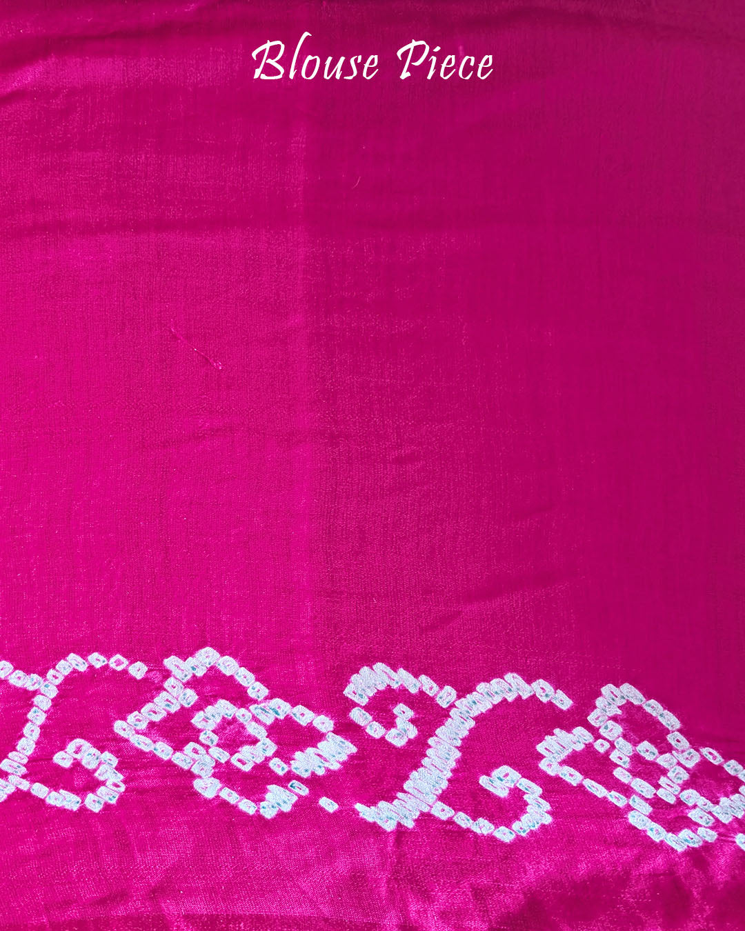 Matching Rani Pink blouse piece of the Sage Green Pure Gajji Silk Bandhani Saree