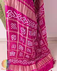 Full pallu view showcasing the traditional Rani Pink Gharchola pattern on the Sage Green Pure Gajji Silk Saree