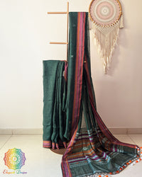 Green linen Bhujodi weave saree on mannequin showing complete drape and fall