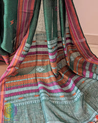 Palla close up on green linen saree highlighting Bhujodi weave detail