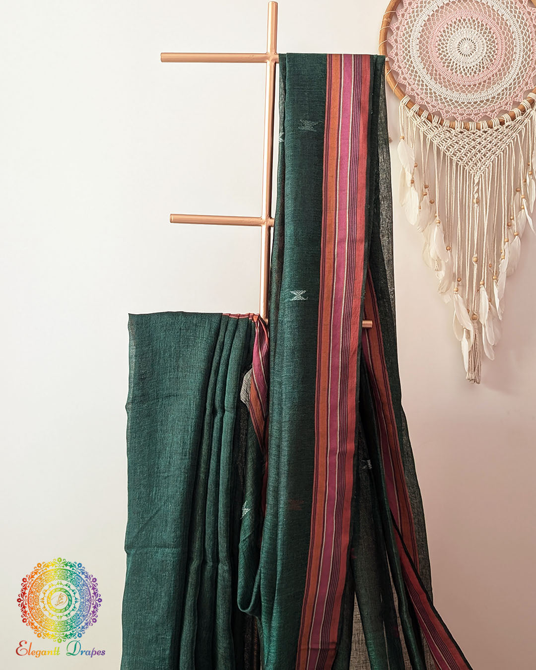 Green linen saree body close up highlighting Bhujodi weave texture