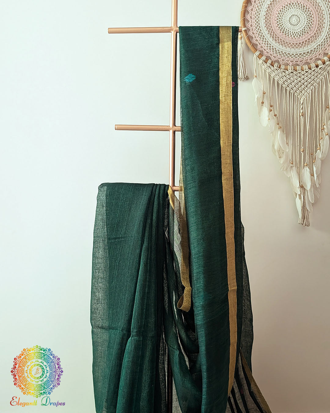 Green linen saree body close up highlighting natural texture and weave