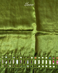 Close-up of Kutch mirror embroidery on sleeve of Green Mashru Silk Blouse Piece