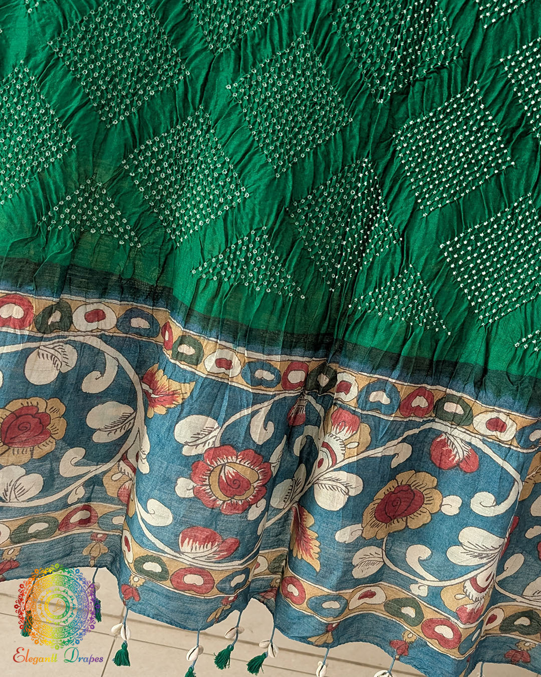 Close-up of the hand-painted Kalamkari floral border on the Green Muga Silk Dupatta