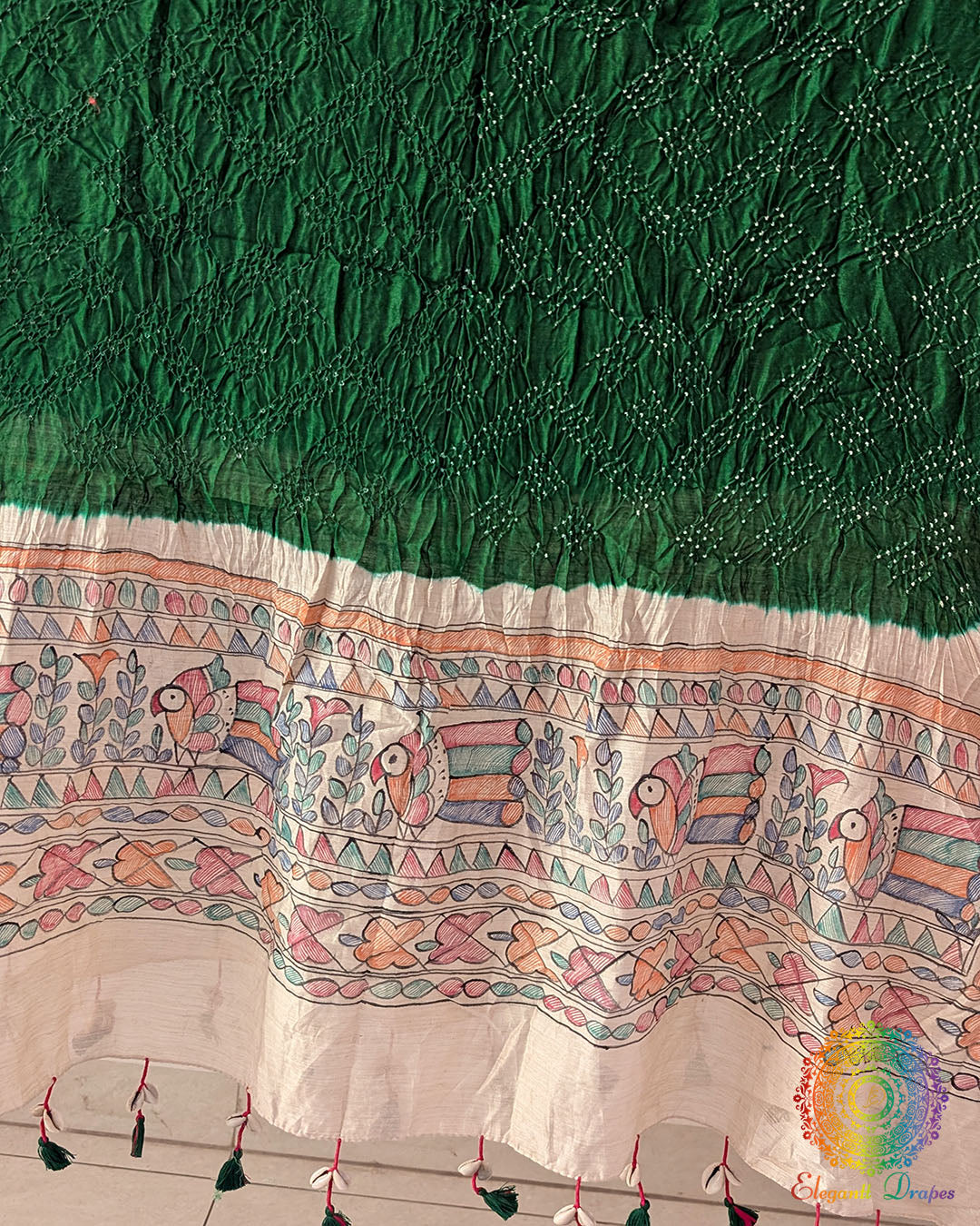 Close-up of the hand-painted Madhubani artwork on the Green Muga Silk Dupatta
