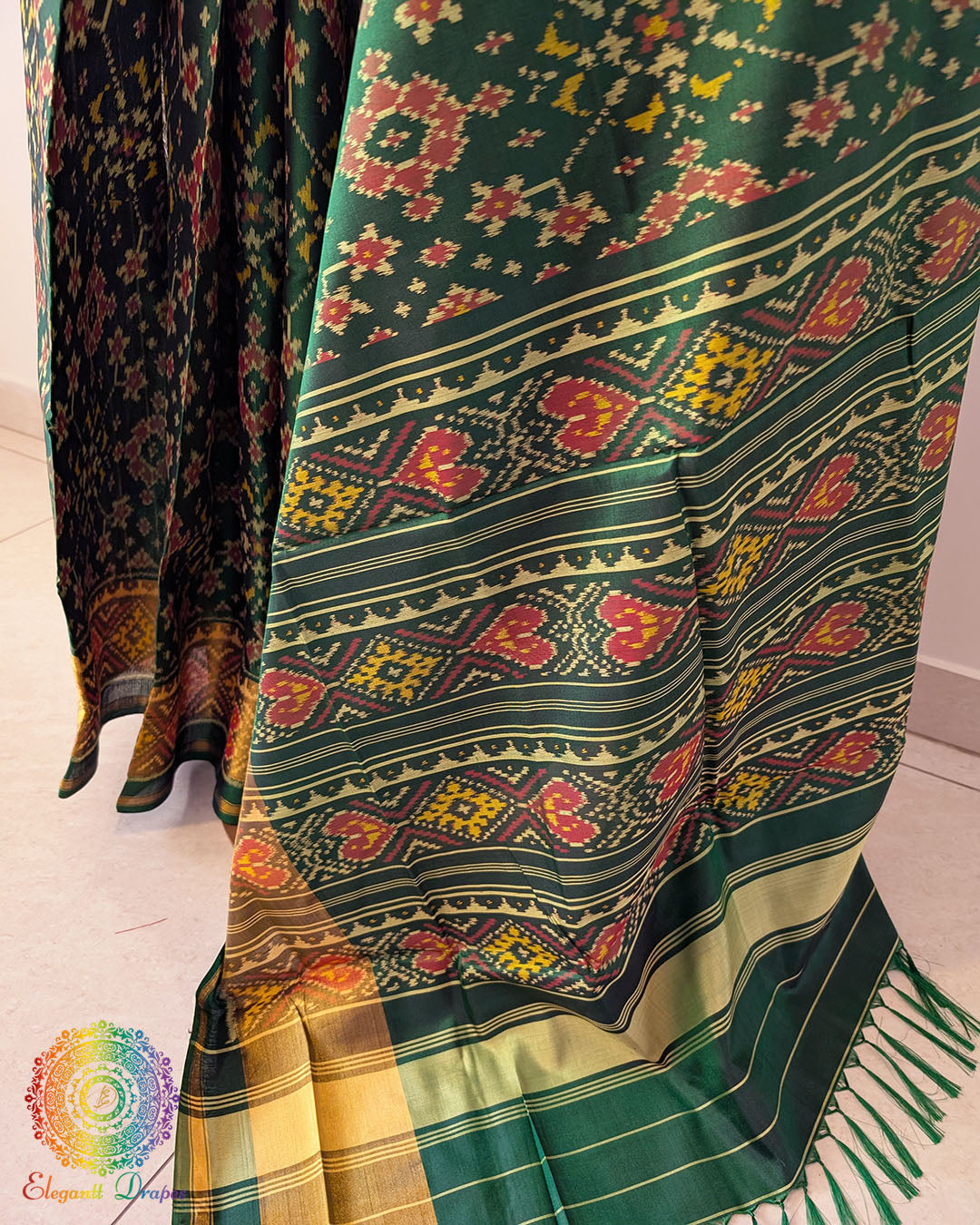 Green pure mulberry silk Rajkot Patola saree palla