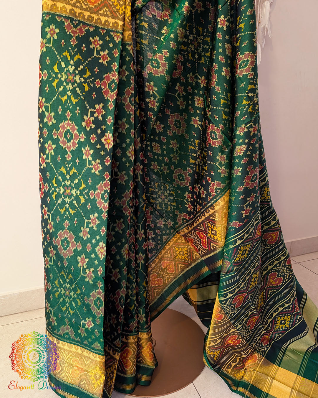 Green pure mulberry silk Rajkot Patola saree pleats