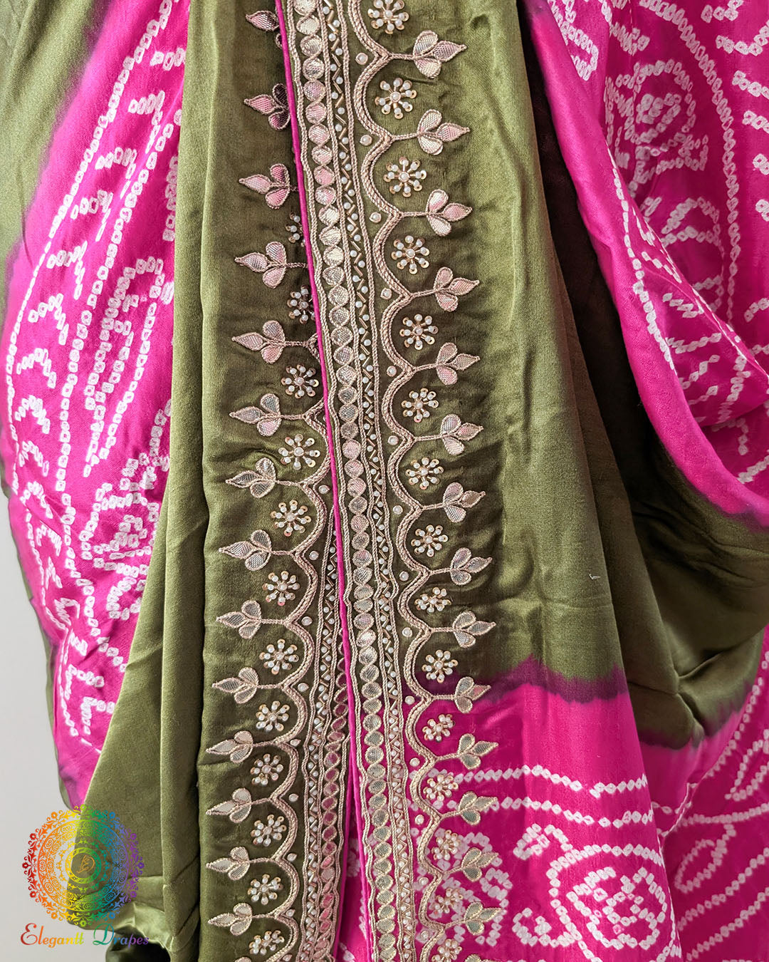 Close-up of the border of the Green Pink Gaji Silk Rasmandaal Saree, highlighting the intricate Gota Patti embellishments, traditional patterns and rich silk texture.