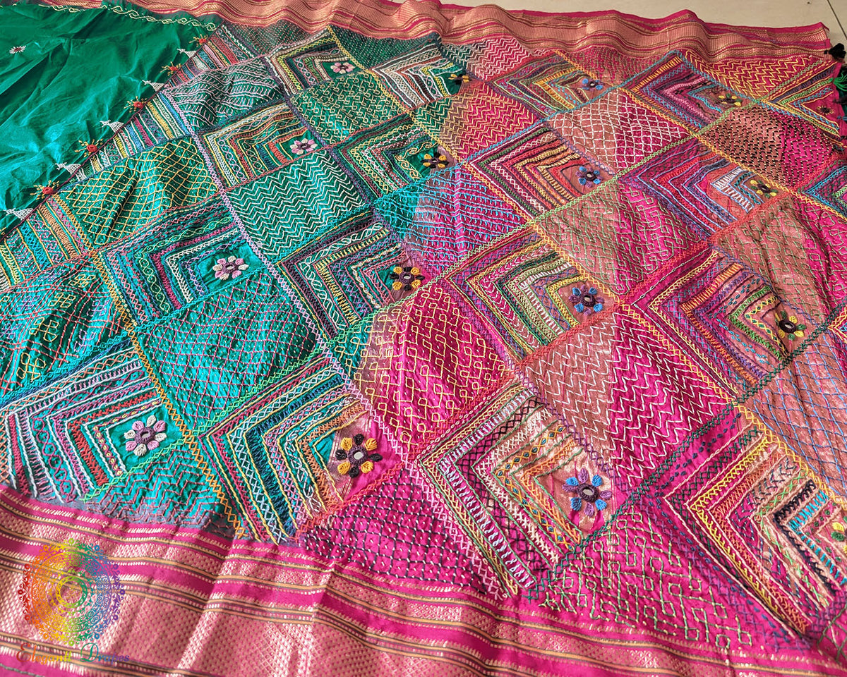 Detailed view of handcrafted embroidery on pink palla of Ilkal silk saree
