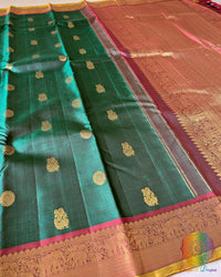 Green Kanjivaram silk saree body close up highlighting rich zari weaving