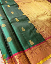 Red palla close up showcasing intricate 2 gram zari weaving on Kanjivaram silk saree