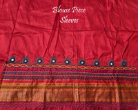 Blouse sleeve detail showing embroidery and finishing
