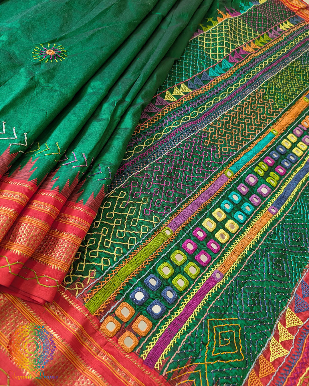 Green Ilkal silk saree body close up highlighting embroidery detail