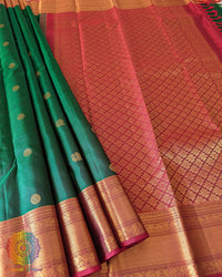Detailed view of the palla and gold zari design on the Green Pure Kanjivaram Handloom Silk Saree, showcasing the silk texture and traditional craftsmanship.