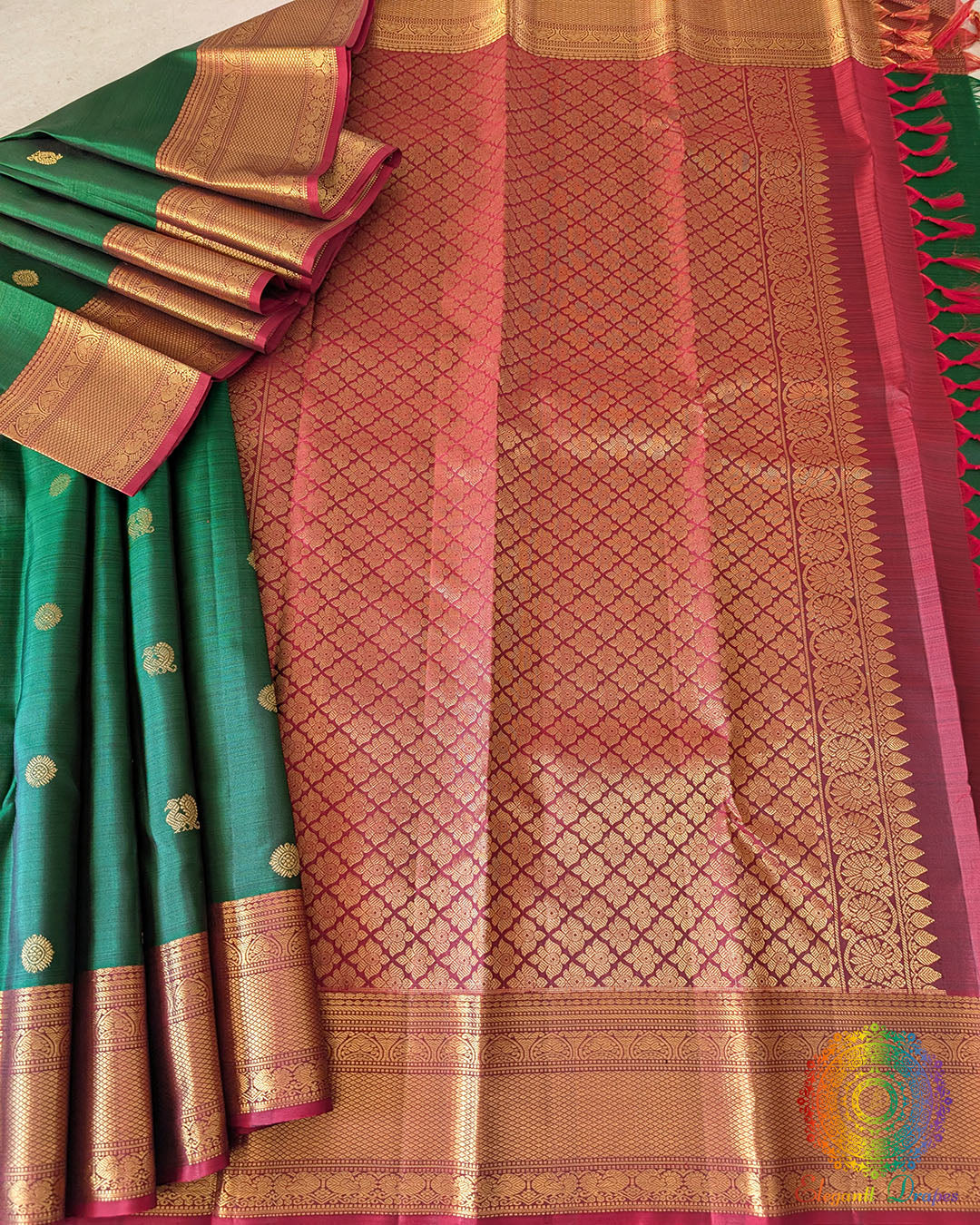 Green Pure Kanjivaram Handloom Silk Saree shown in a full open view, highlighting the vibrant green colour, silk texture and traditional Kanjivaram weaving.