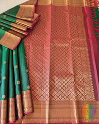 Green Pure Kanjivaram Handloom Silk Saree shown in a full open view, highlighting the vibrant green colour, silk texture and traditional Kanjivaram weaving.